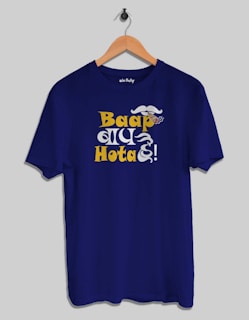 A blue t-shirt with a humorous design featuring a mustache and the text 'Baap Hota Hai!' in bold yellow and white letters. A hand holding a cigar is part of the design.