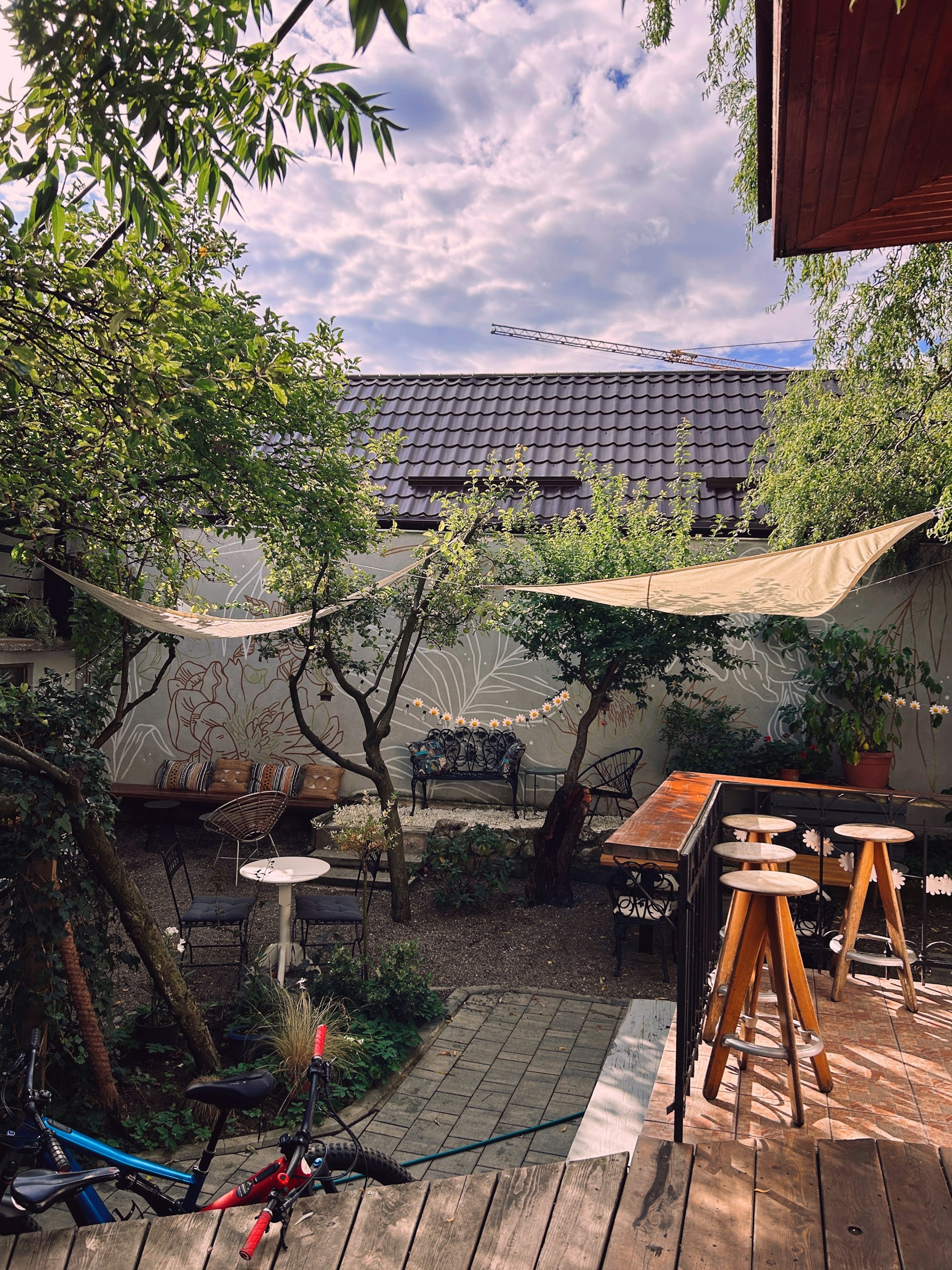 woman wearing yellow long-sleeved dress under white clouds and blue sky during daytime