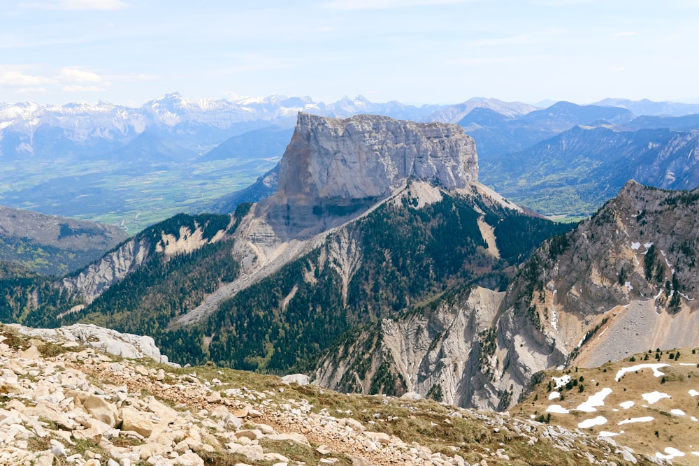 a view of a mountain range with mountains in the background