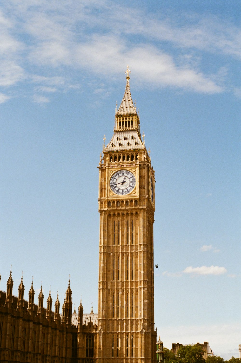 a tall clock tower towering over a city