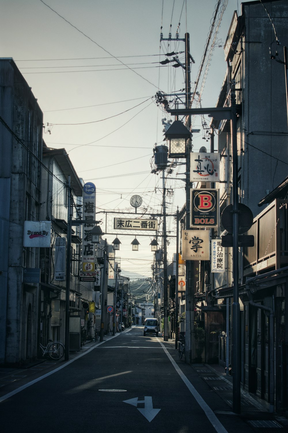 a city street with buildings and signs on it