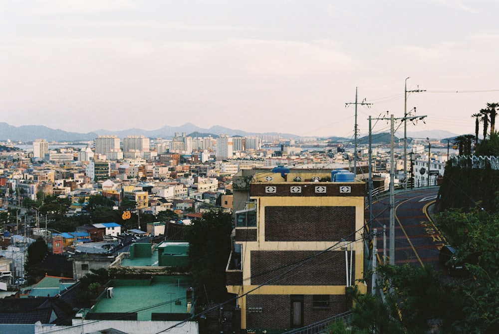 a view of a city from a hill