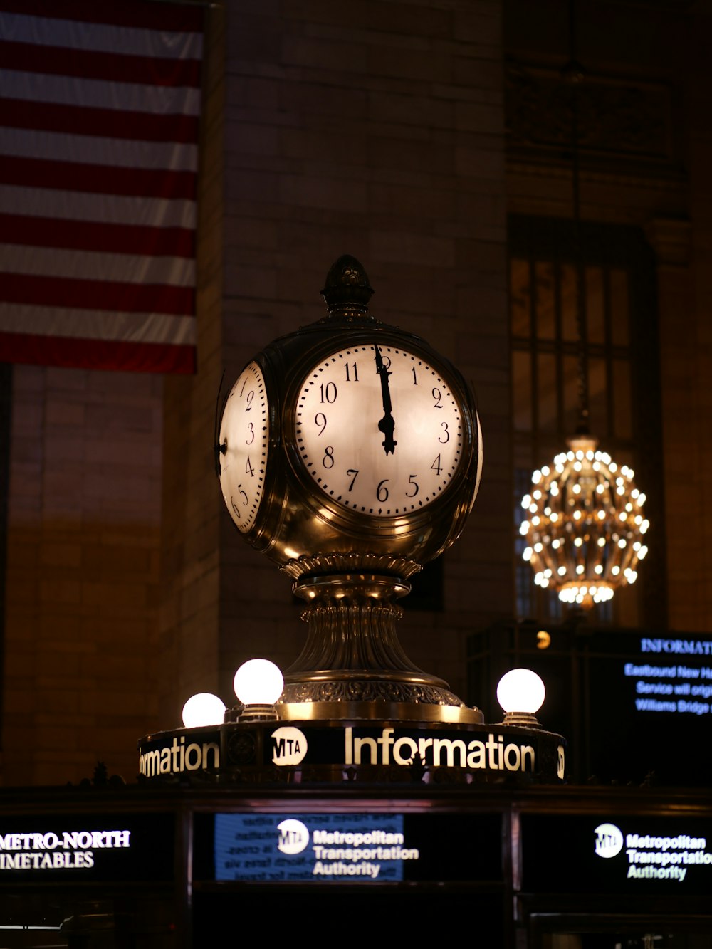 a clock on top of a building at night