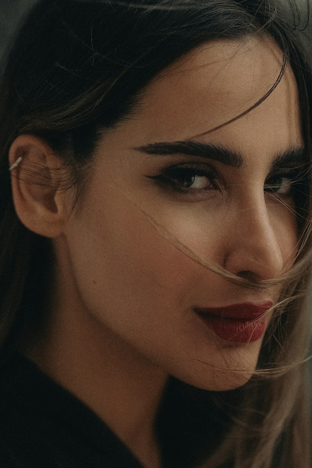 a close up of a person with long hair