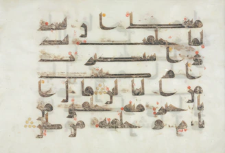 a group of arabic writing on a piece of paper