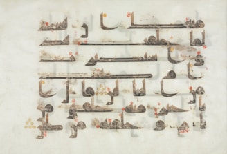 a group of arabic writing on a piece of paper
