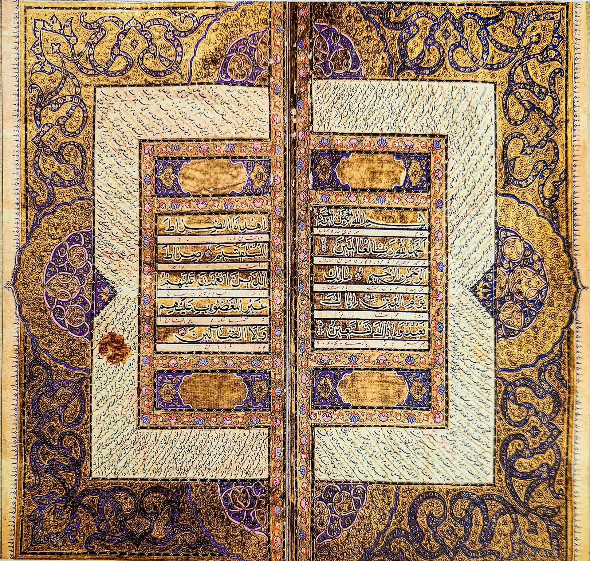 An intimate close-up of an ancient manuscript page, highlighting delicate calligraphy and intricate illustrations.