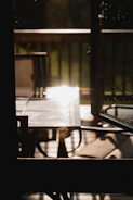 Natural light illuminating a resin table drying on a workbench