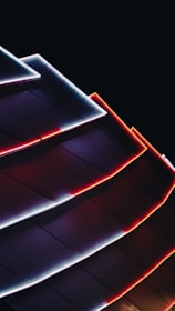 Close-up of a futuristic architectural model illuminated with green neon lines, representing strategic brand construction.