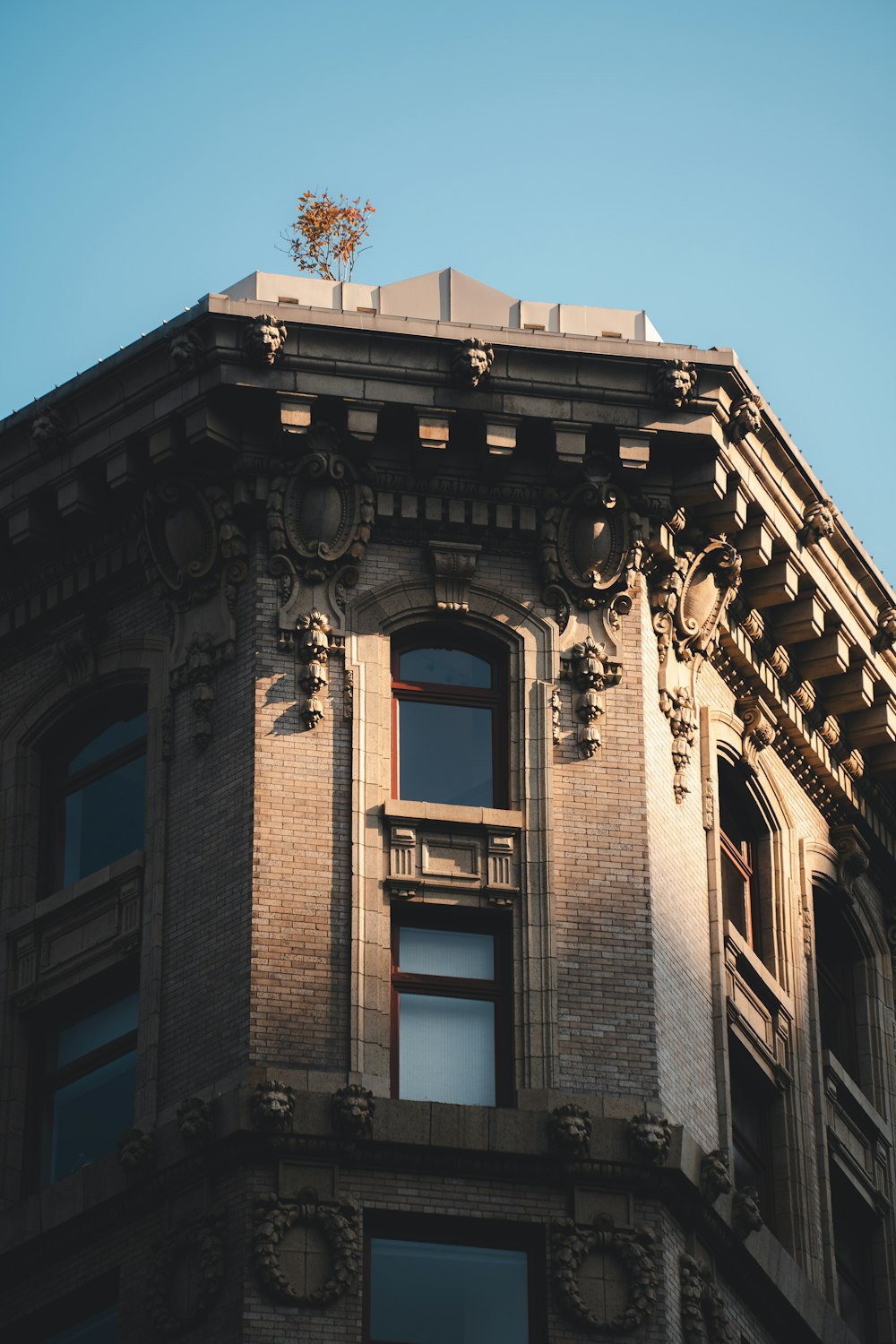 a tall building with a clock on the top of it