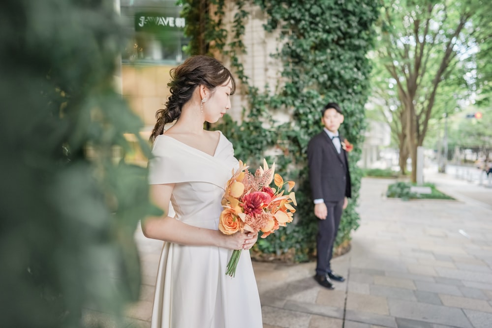 a man and a woman standing next to each other