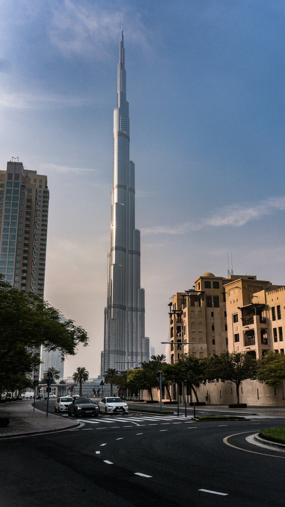 a very tall building towering over a city