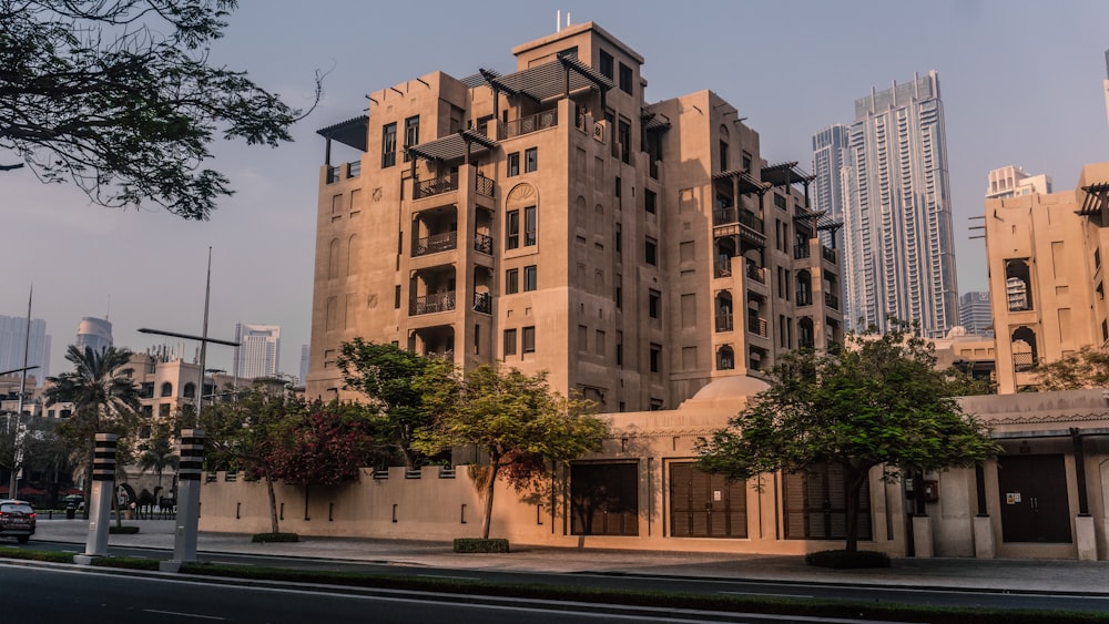 a tall building sitting on the side of a road