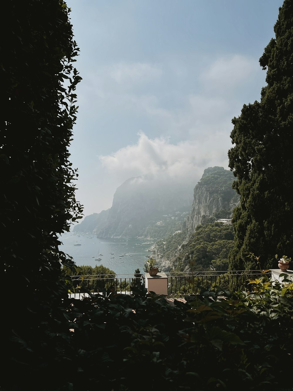 a scenic view of a body of water with a mountain in the background