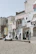 Cozy seaside retreat setting on the Sicilian coast with participants engaged in discussion.