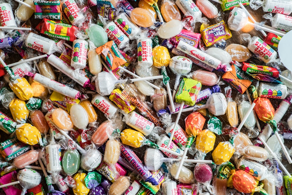 a pile of assorted candy on a table