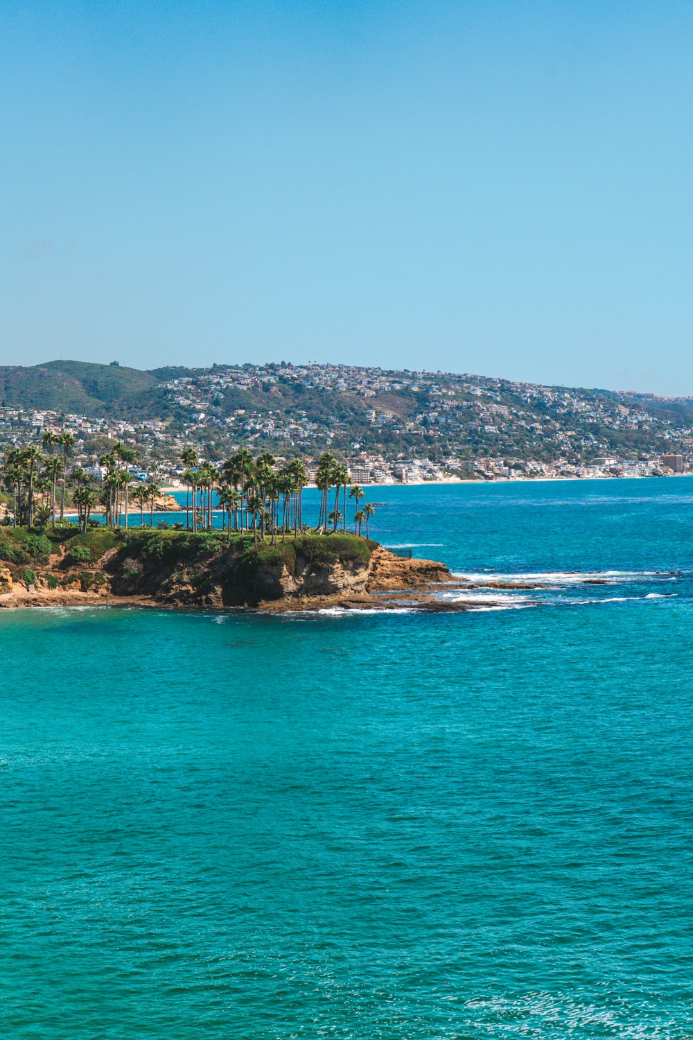 a view of a beach with a boat in the water