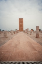 a large building with a tower in the middle of it