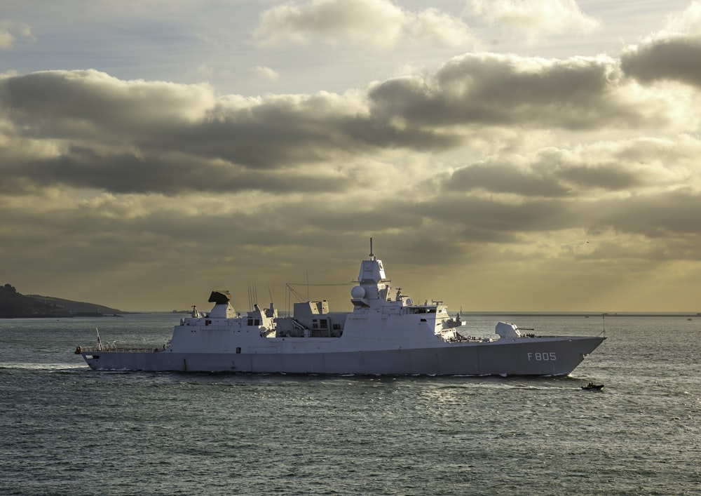 a large white ship in the middle of the ocean