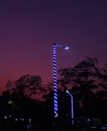 Close-up of energy-efficient LED streetlights glowing at dusk.