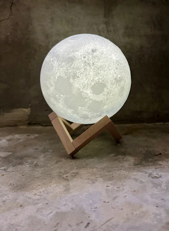 Close-up of handcrafted Moonshire product details illuminated by soft moonlight.