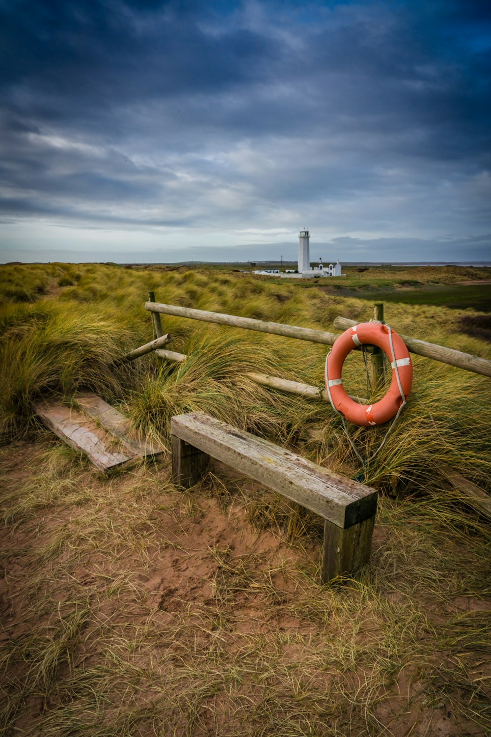 a life preserver and a life preserver on a beach