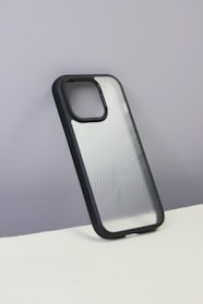 A sleek black phone case with a minimalist geometric pattern.