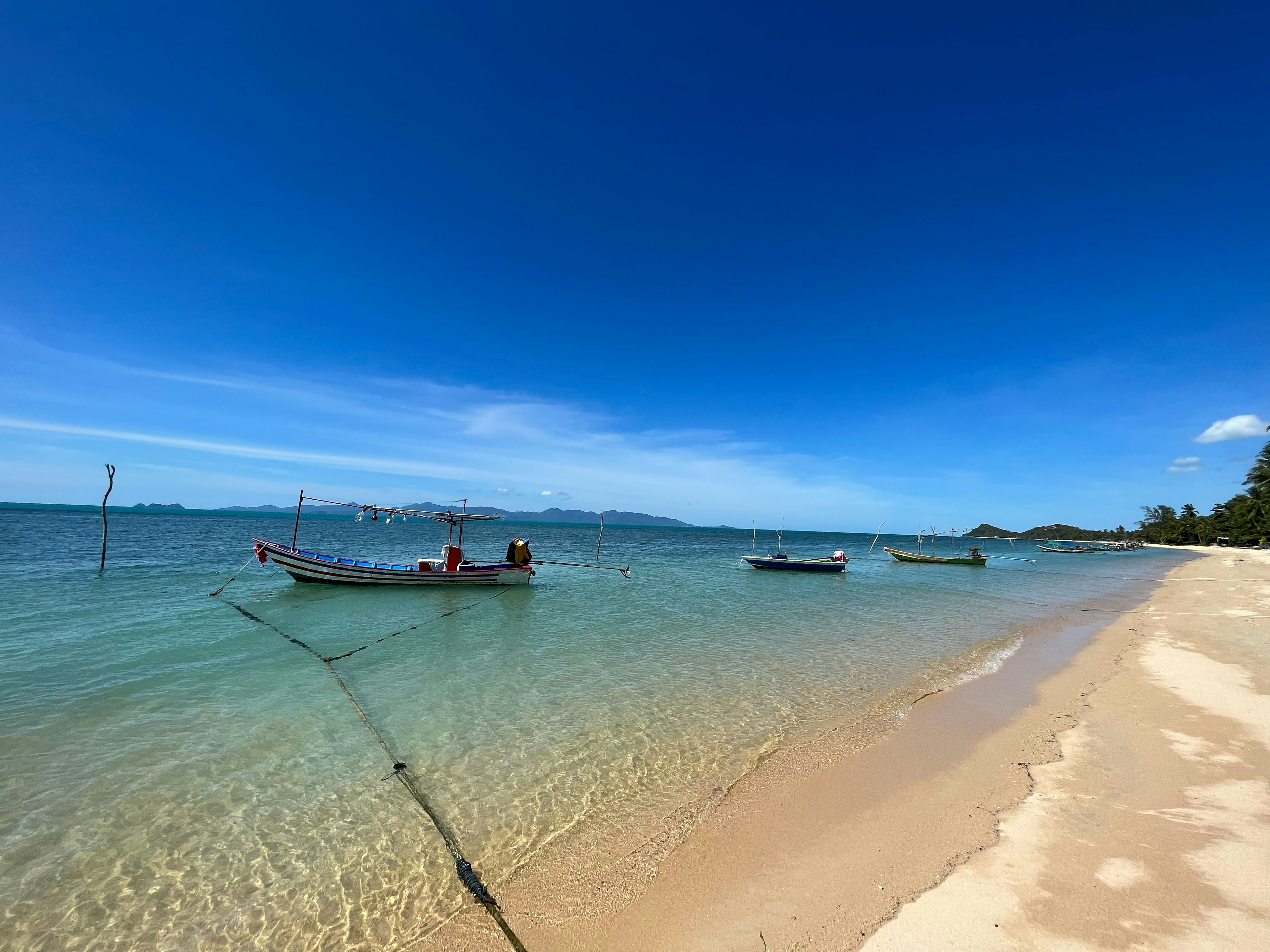a couple of boats that are sitting in the water