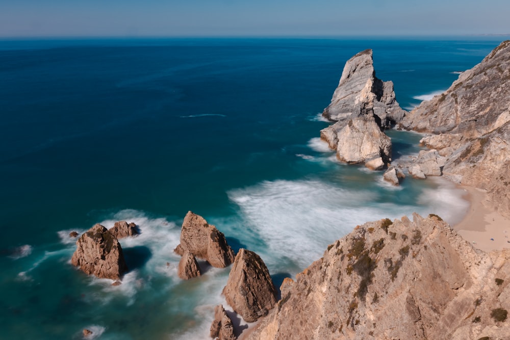 a view of the ocean from the top of a mountain