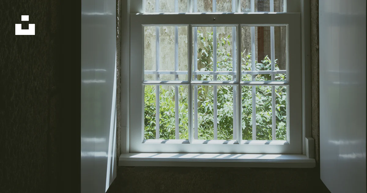 Unsplash Window A window in a building with a view of the outside photo – Free Window ...