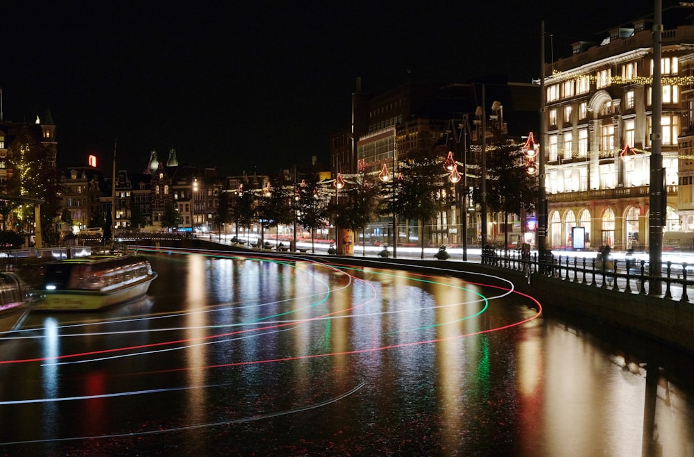 a river running through a city at night