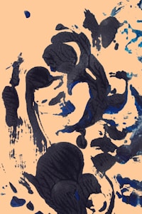 Abstract black and blue brushstrokes scattered on a light beige background, creating an impressionistic and dynamic composition with varying shapes and textures.
