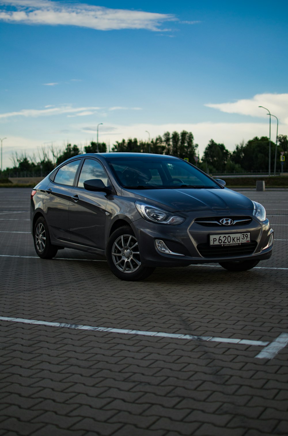 a black car parked in a parking lot