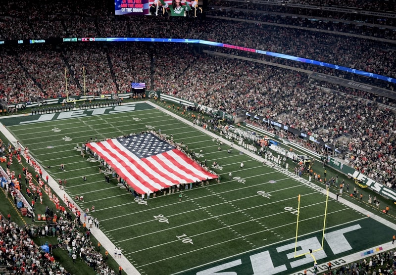 MetLife Stadium field with giant American flag