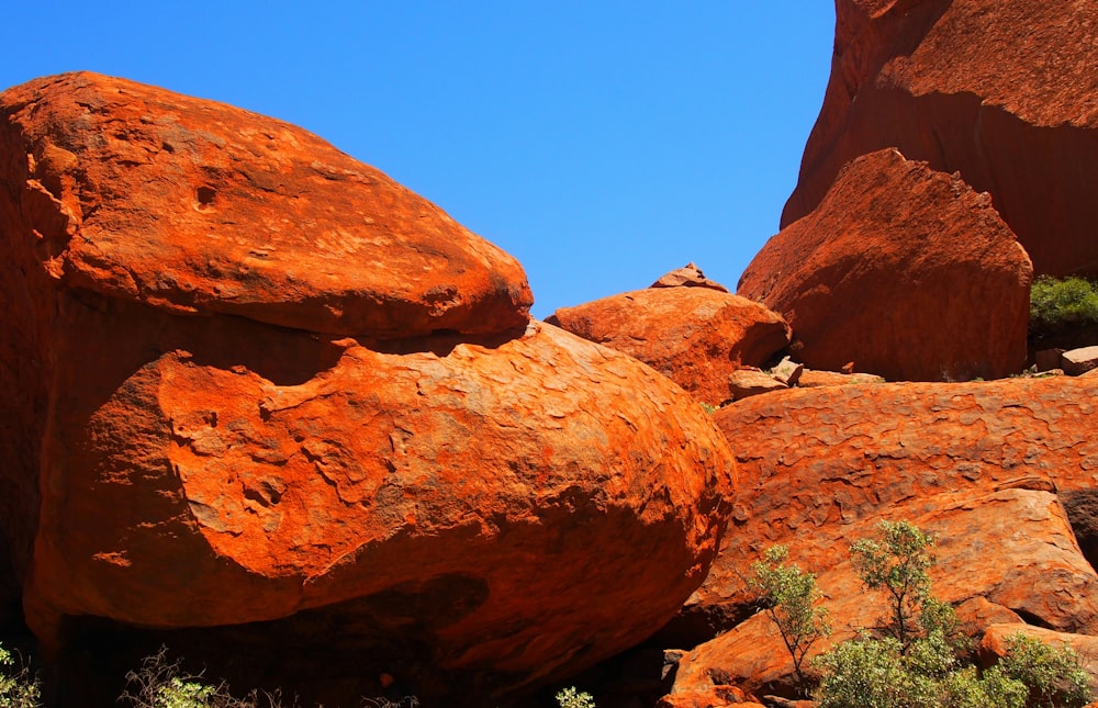 a large rock formation in the middle of a desert