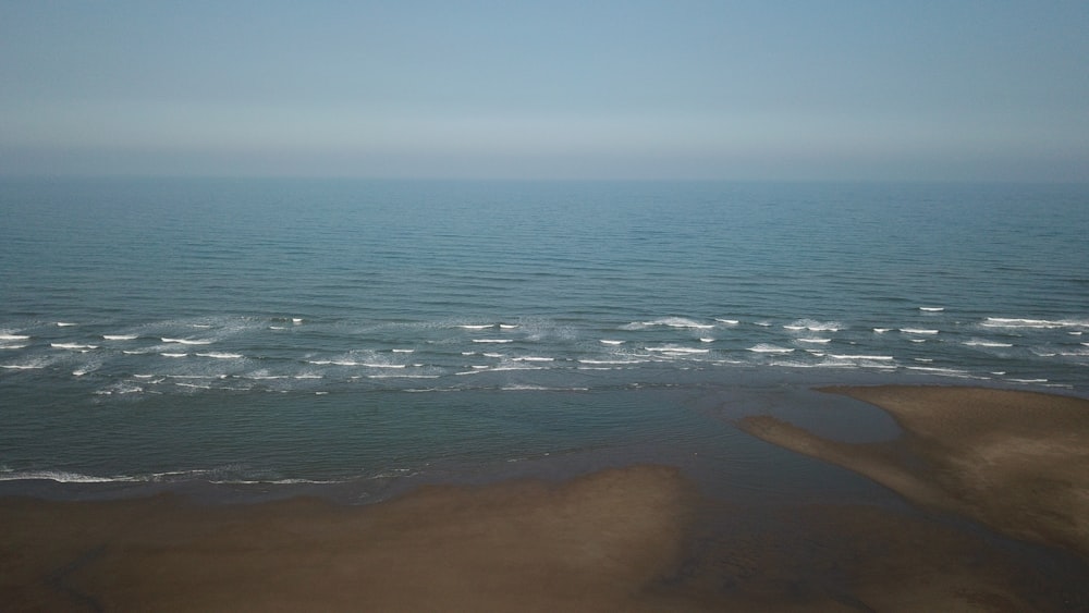 a view of the ocean from a beach