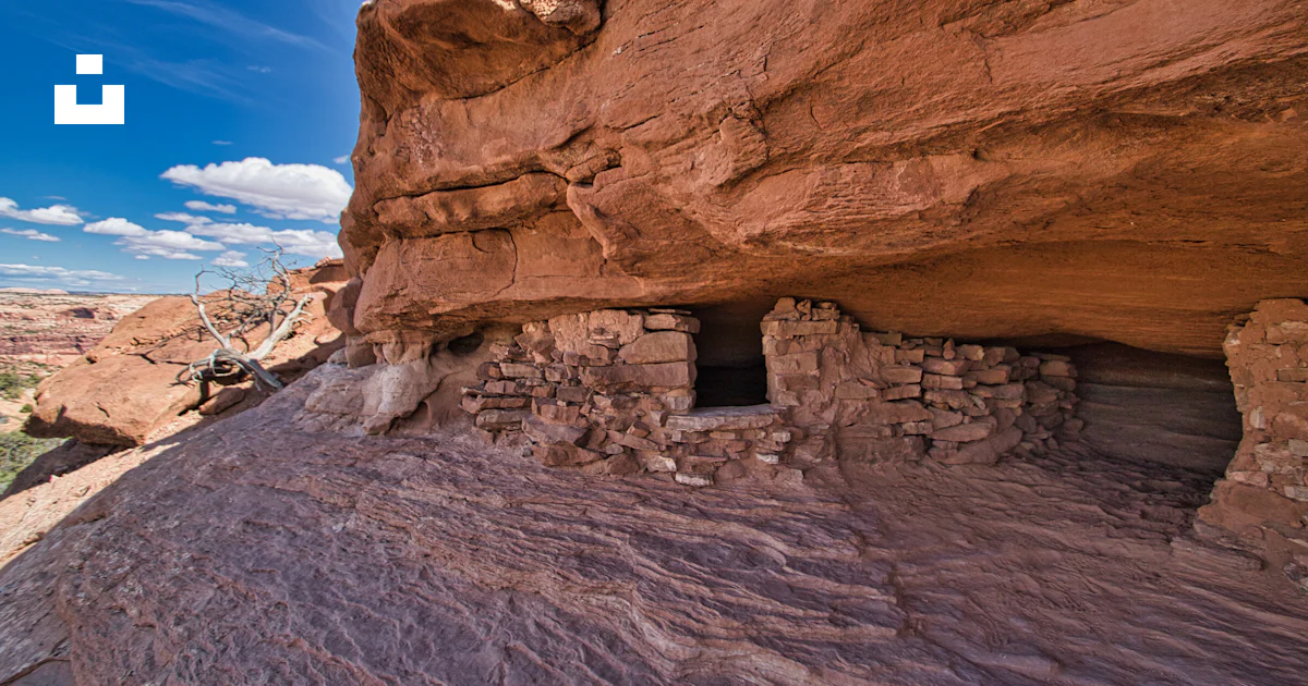 A rock house built into the side of a cliff photo – Free Canyonlands ...