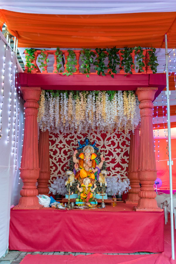 Traditional decorated stage with floral backdrop