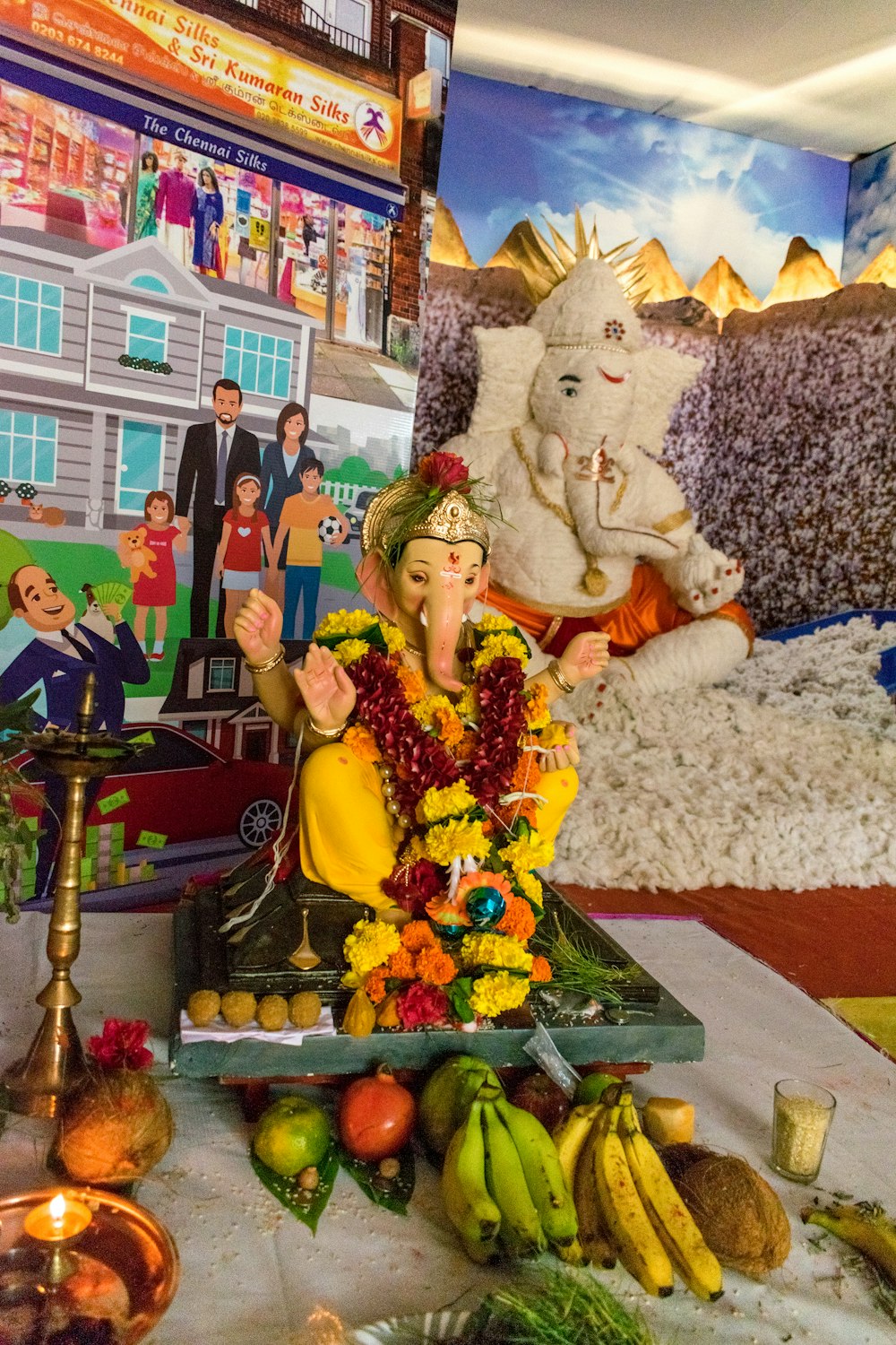 there is a statue of lord ganesh on the table