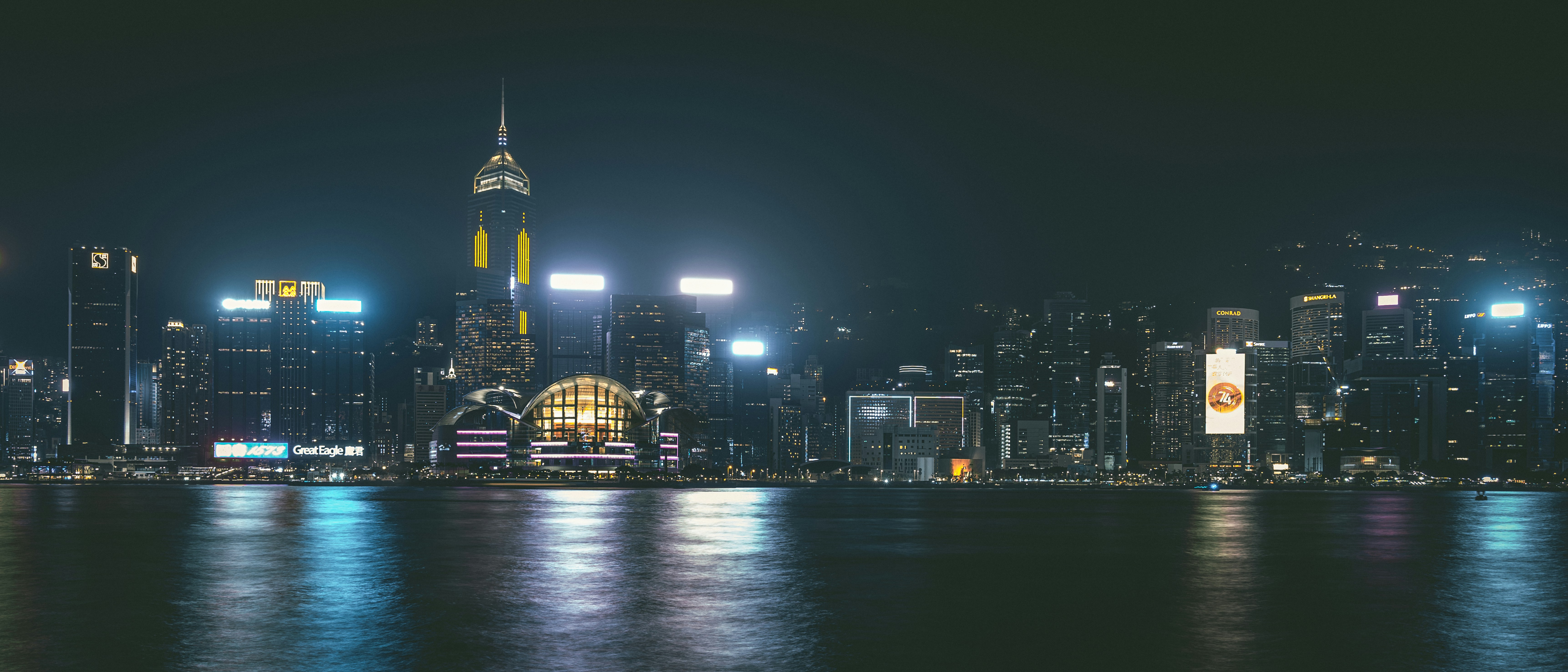 a view of a city at night from across the water