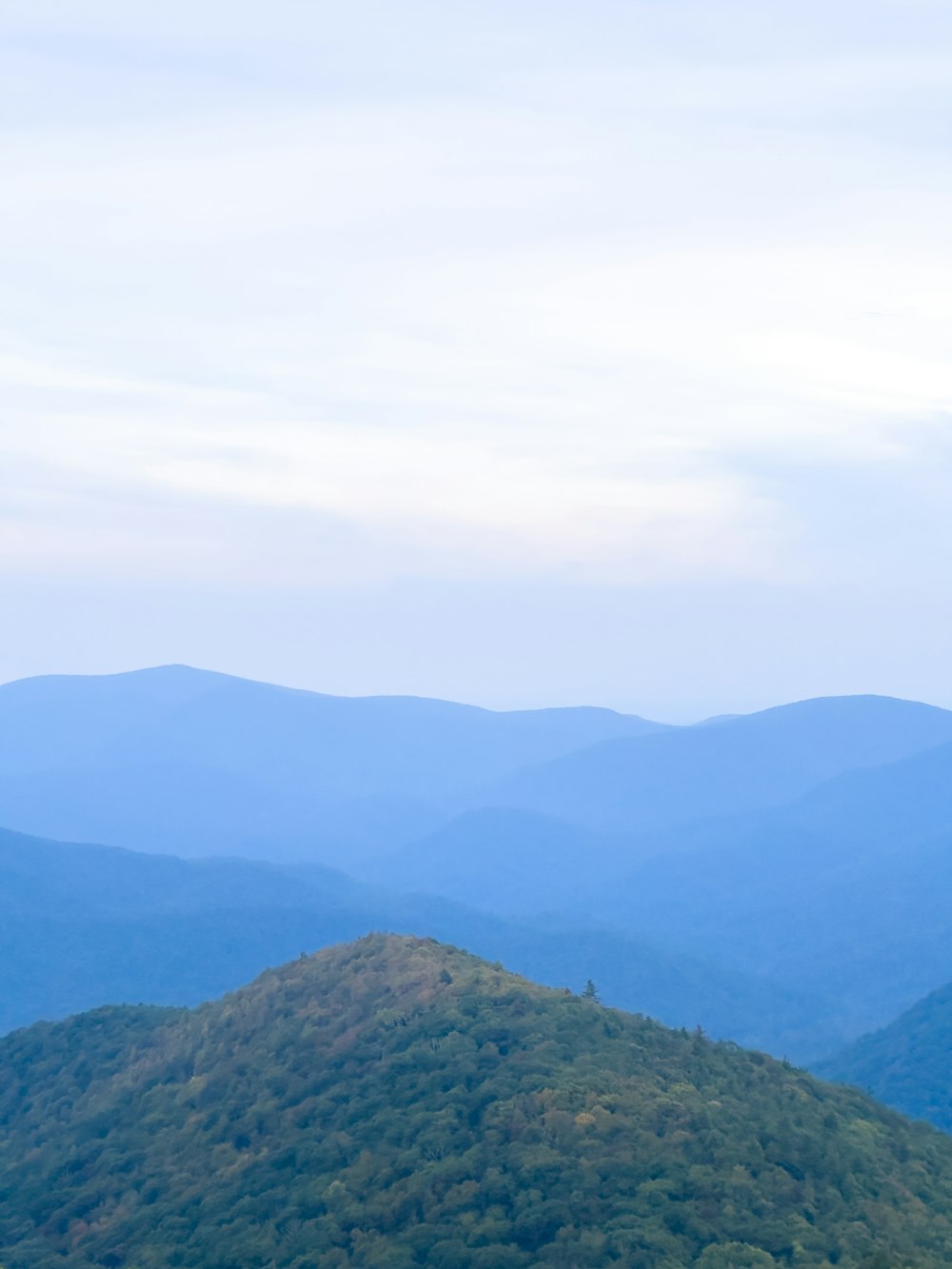 a view of a mountain range from a distance