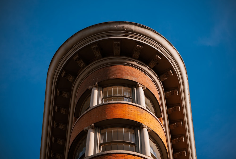 a very tall building with a sky in the background