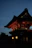 Architectural detail of a traditional Japanese temple bathed in gentle morning light.