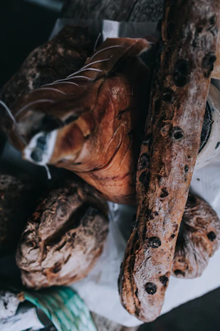 Elegant jars of trucha rillette arranged with local olives and crusty bread.