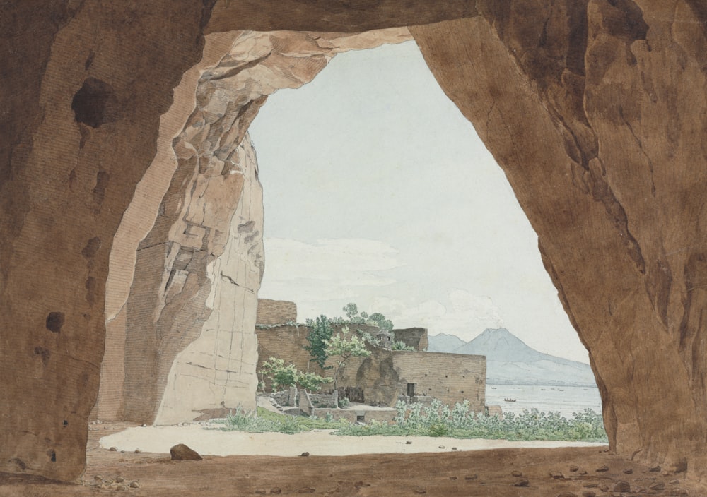a painting of a cave with a view of the ocean