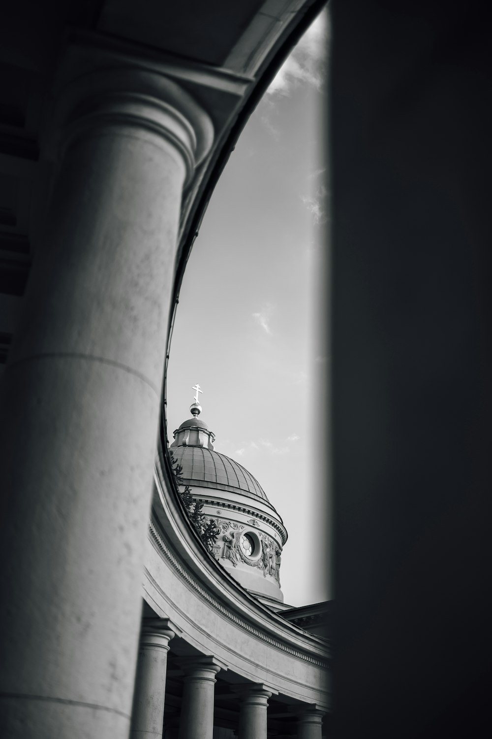 a black and white photo of a domed building