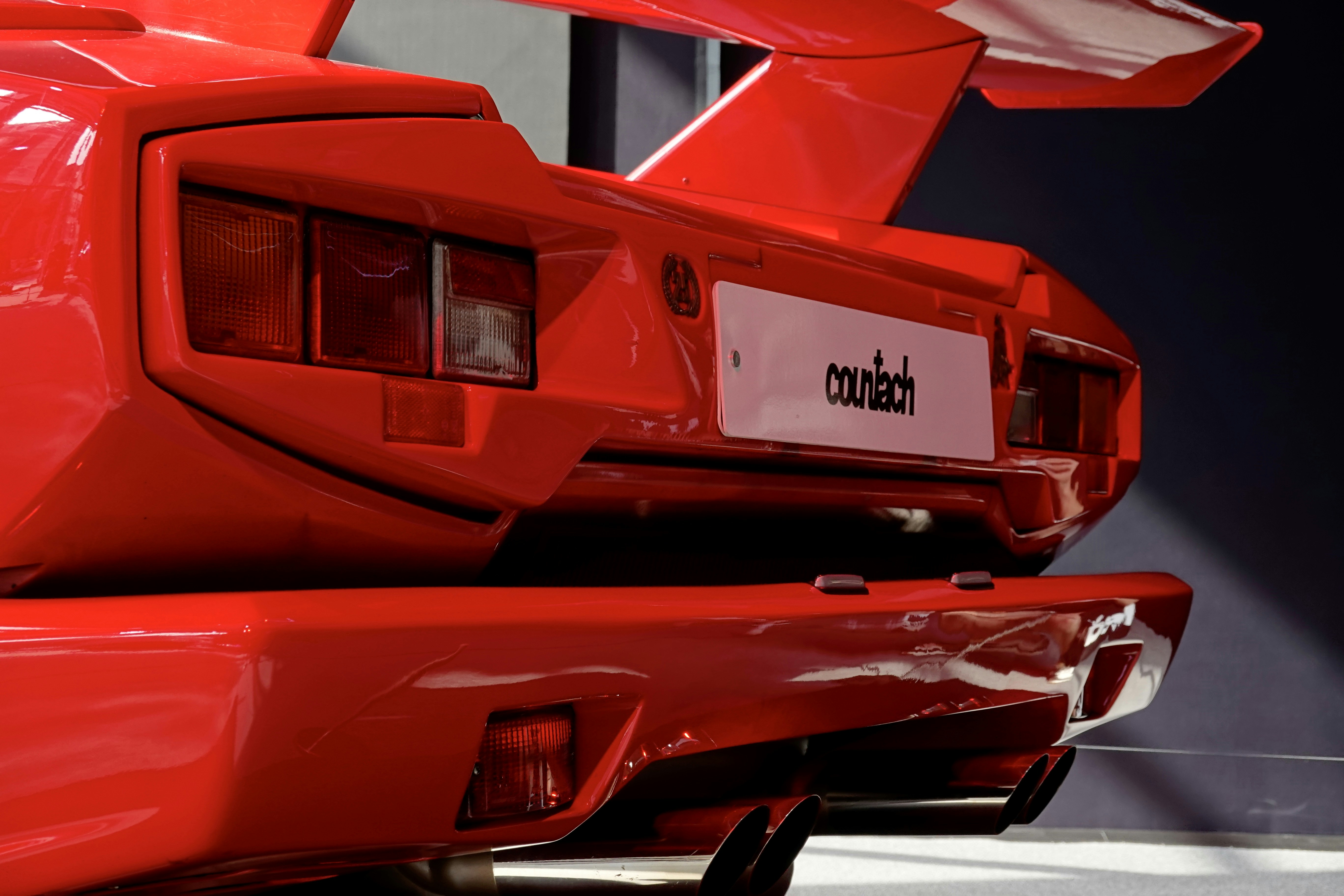 a close up of a red sports car