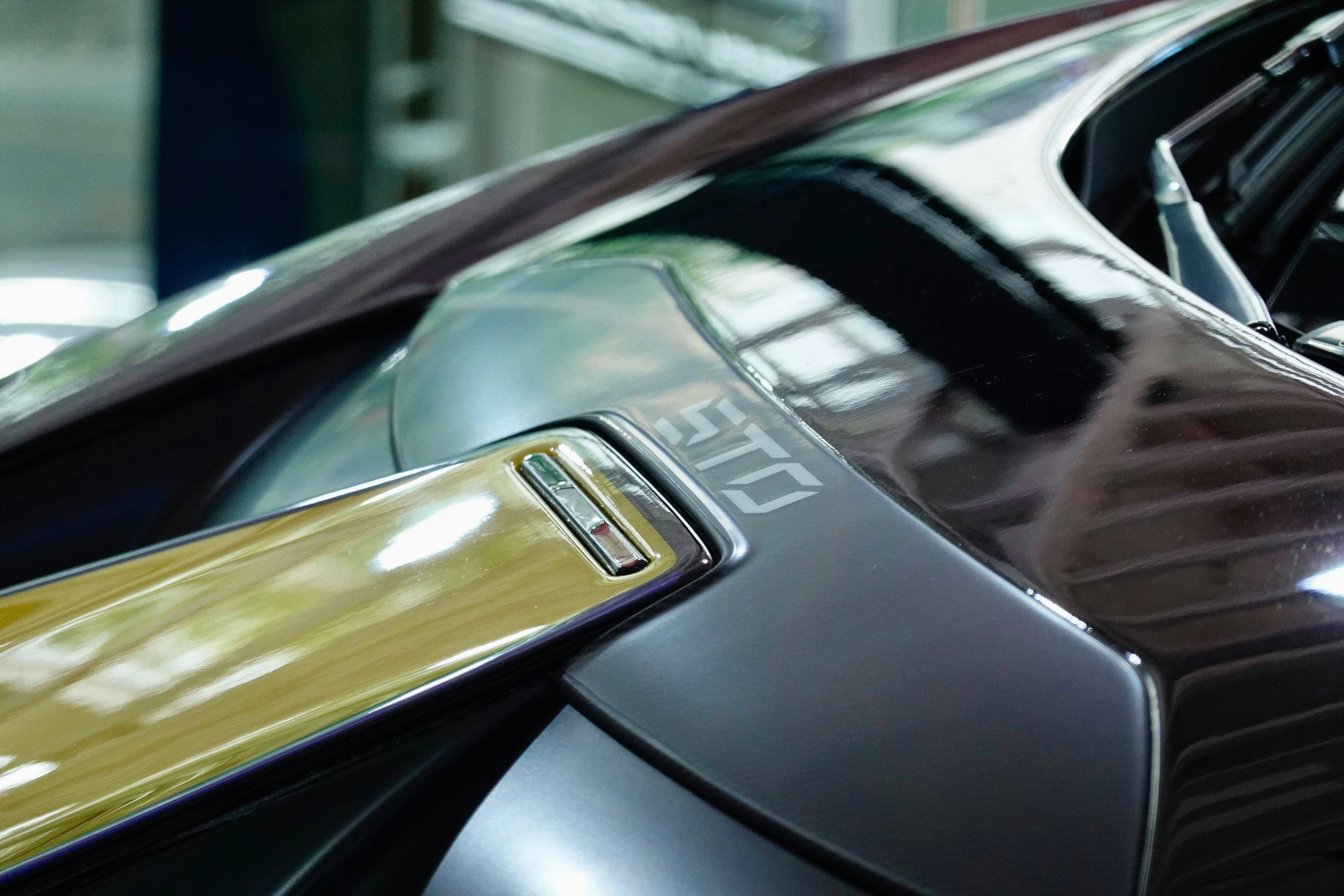 The Badge on That Luxury Car Is Doing More Work Than the Engineering Underneath It