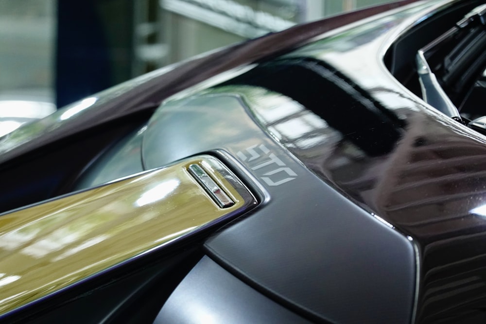 a close up of a car door handle on a car