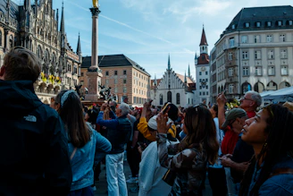 A vibrant photo of a diverse group of influencers sharing travel moments against a scenic European backdrop.